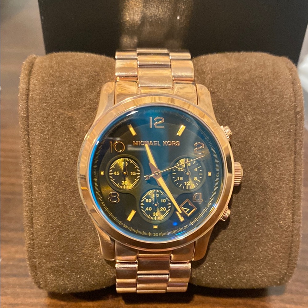 Never worn/Michael Kors Gold and Blue Watch